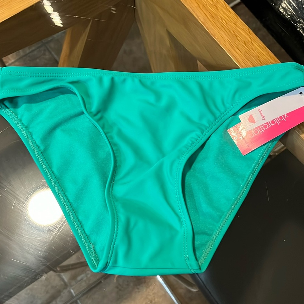 New with tags size small 0/2 exhilaration teal blue bikini bottom. Cheeky cut.